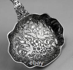Magnificent Antique Silver Tea Strainer, richly chiseled Dutch style
