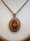 Old Antique Pendant In Solid Silver And Bressan Enamels, Red Background