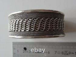 Old large woven solid silver art deco era bangle in its box