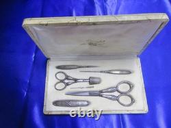 Old solid silver sewing kit