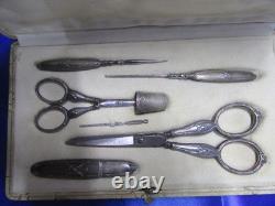Old solid silver sewing kit