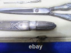 Old solid silver sewing kit