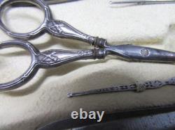 Old solid silver sewing kit