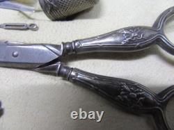 Old solid silver sewing kit
