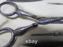 Old solid silver sewing kit
