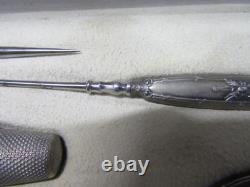 Old solid silver sewing kit