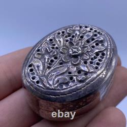 Rare antique Indian secret box in solid silver with a superb floral motif