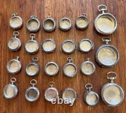 Solid silver and gold decoration. 23 cases of vintage watches. Total 236 g.