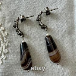 Solid silver carved agate, creator of antique earrings