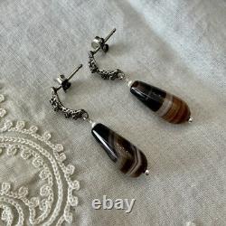 Solid silver carved agate, creator of antique earrings