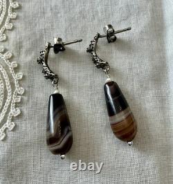 Solid silver carved agate, creator of antique earrings