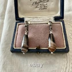 Solid silver carved agate, creator of antique earrings