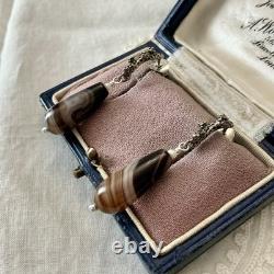 Solid silver carved agate, creator of antique earrings