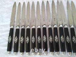 Translation: 'ANTIQUE 19th CENTURY SOLID SILVER EBONY EMPIRE KNIVES SET OF 3 X 18 KNIVES BY Paul Canaux'