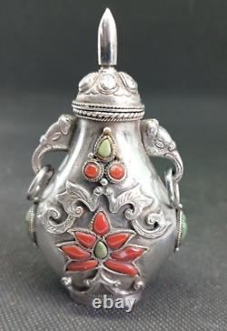 Translation: Ancient Chinese Snuff Bottle with Tibetan Solid Silver and Coral Punch Mark