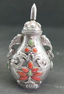 Translation: Ancient Chinese Snuff Bottle with Tibetan Solid Silver and Coral Punch Mark