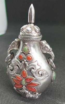 Translation: Ancient Chinese Snuff Bottle with Tibetan Solid Silver and Coral Punch Mark