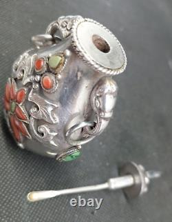 Translation: Ancient Chinese Snuff Bottle with Tibetan Solid Silver and Coral Punch Mark