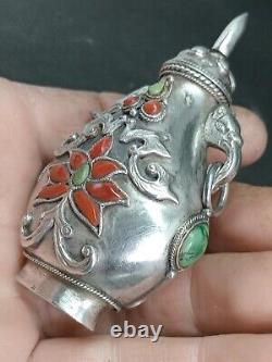 Translation: Ancient Chinese Snuff Bottle with Tibetan Solid Silver and Coral Punch Mark