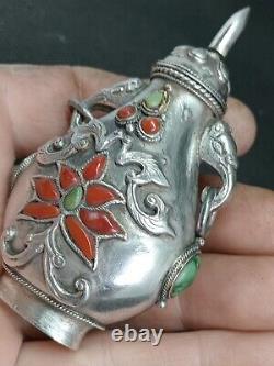 Translation: Ancient Chinese Snuff Bottle with Tibetan Solid Silver and Coral Punch Mark