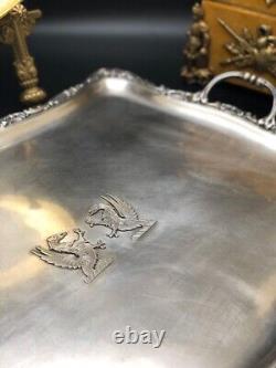 Translation: Ancient, very beautiful, large solid silver tray. 1 title. Rudolph Beunke