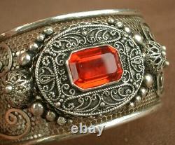Translation: 'Beautiful Ancient Berber Bracelet in Solid Silver and Red Stone'