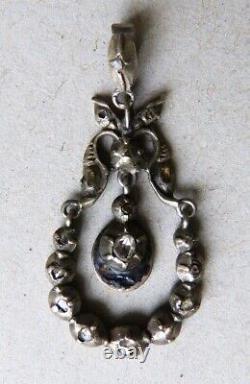 Trembling pendant in solid silver with diamonds, 19th-century antique jewelry.