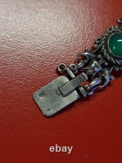 Very beautiful antique articulated bracelet in solid silver and green cabochons