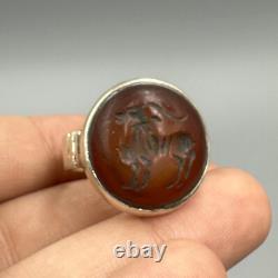 Very old antique solid silver ring with engraved agate stone, anima Very old antique solid silver ring with engraved agate stone, anima