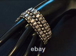 Vintage Articulated Sterling Silver Cuff Bracelet with Floral Motifs, Sublime