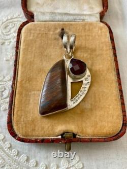 Vintage Solid Silver Pendant with Boulder Opal and Unique Garnet Creator