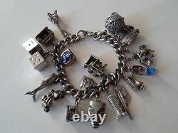 Ancien bracelet en argent massif Charms Articulés