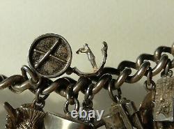 Ancien bracelet en argent massif Charms Articulés