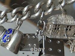 Ancien bracelet en argent massif Charms Articulés