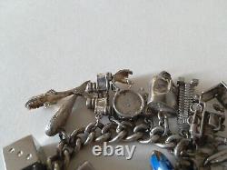 Ancien bracelet en argent massif Charms Articulés