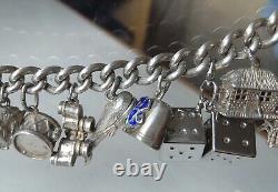 Ancien bracelet en argent massif Charms Articulés