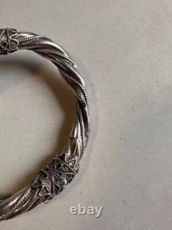 Ancien bracelet jonc en argent massif poinçon 925, têtes de béliers, poids 42.63