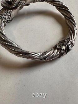 Ancien bracelet jonc en argent massif poinçon 925, têtes de béliers, poids 42.63