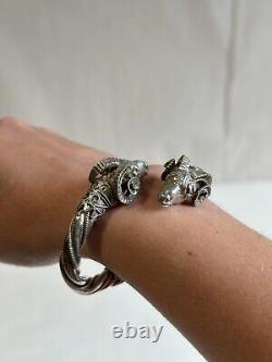 Ancien bracelet jonc en argent massif poinçon 925, têtes de béliers, poids 42.63