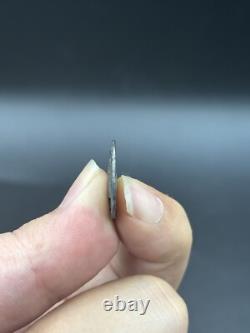 Ancienne pièce rare en argent massif tête de roi grec romain non recherchée