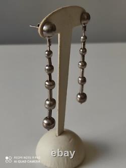 Anciennes boucles d'oreilles pendantes en argent massif
