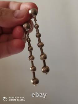 Anciennes boucles d'oreilles pendantes en argent massif