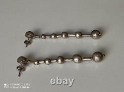 Anciennes boucles d'oreilles pendantes en argent massif