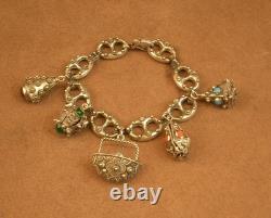 Beau bracelet a breloques ancien en argent massif, maille grain de café