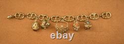 Beau bracelet a breloques ancien en argent massif, maille grain de café