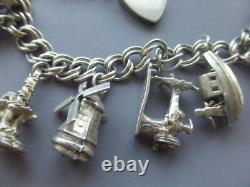 Bracelet ancien argent massif poinçons 13 breloques divers 36gr env. 18cm env