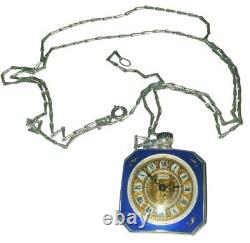 Montre suisse ancienne ninyse en argent 925 et décor en laque bleue et motifs