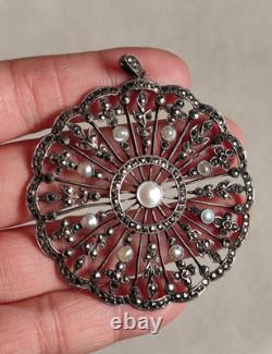 Pendentif ancien en argent ajouré forme rond sertie des marcassites et perles