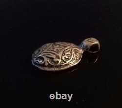 Rare ancien médaillon viking en argent orné de la croix solaire 11th après J-C