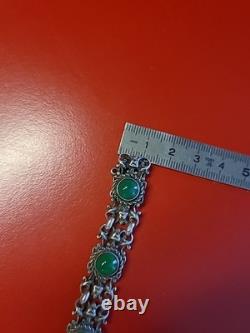 Très beau ancien bracelet articulé en argent massif et cabochons vert sanglier